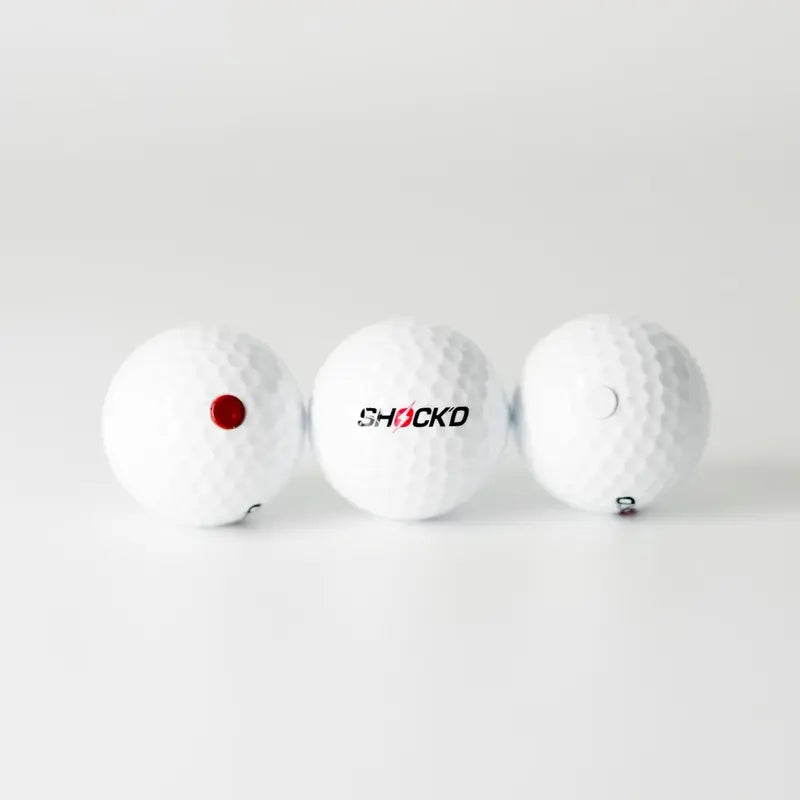 "SHOCK'D Golf Balls: Unleash the Power of the World's LOUDEST Golf Ball - Available in Red or White for the Ultimate Stealth Game"